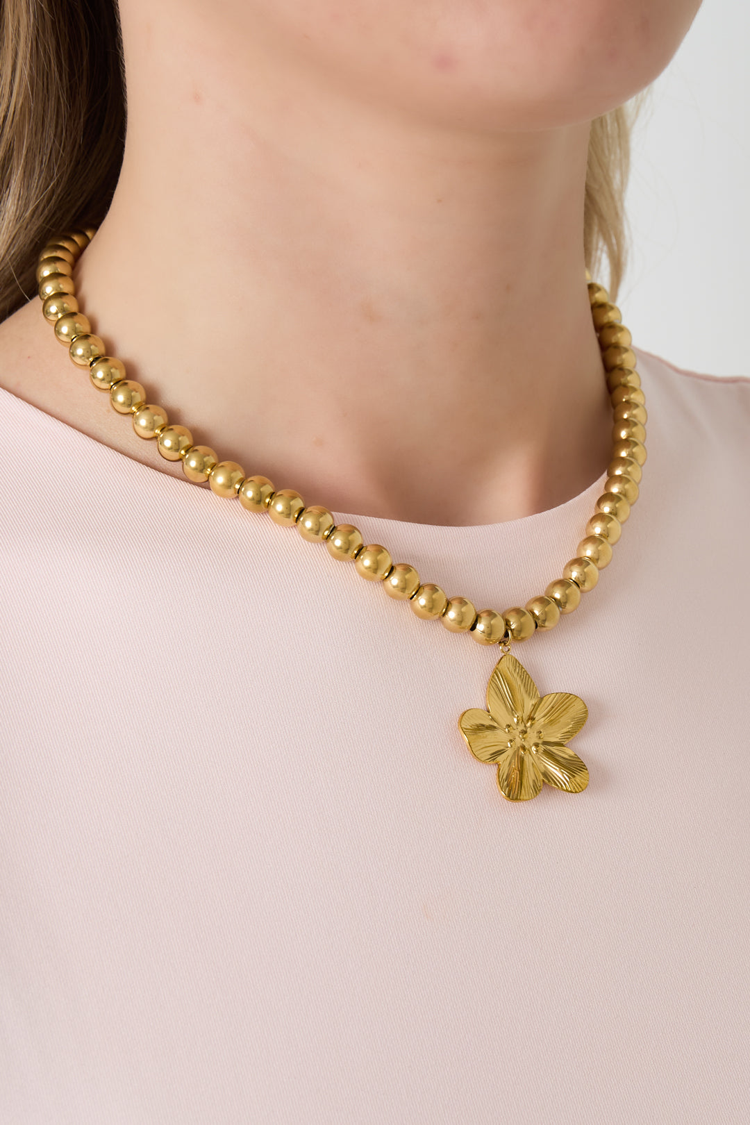 8mm hollow bead necklace with a flower